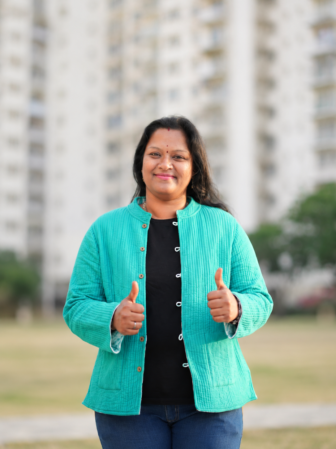 Coach Saraswati giving thumbs up